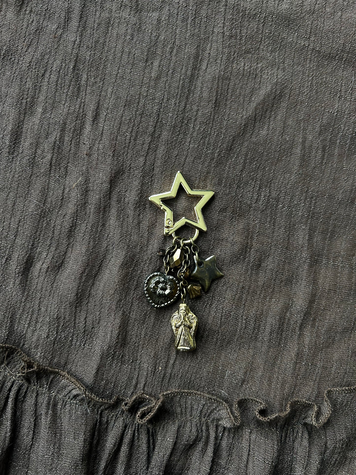 Praying on a Star Keychain