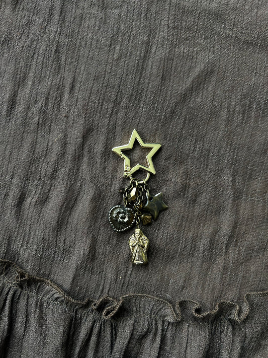 Praying on a Star Keychain